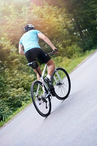 Man riding a bike uphill